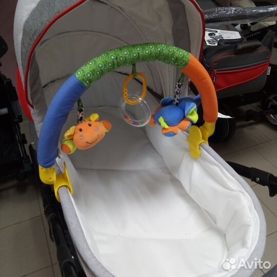 Дуга с подвесными погремушками Elefantino