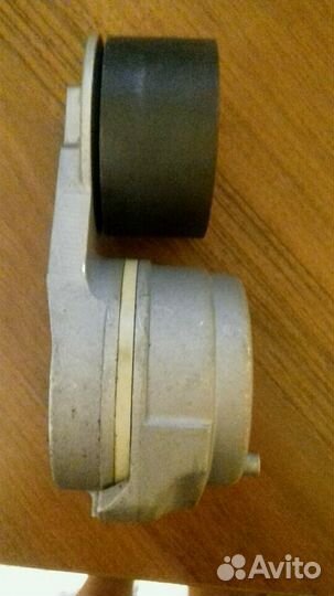 Натяжитель ремня генератора