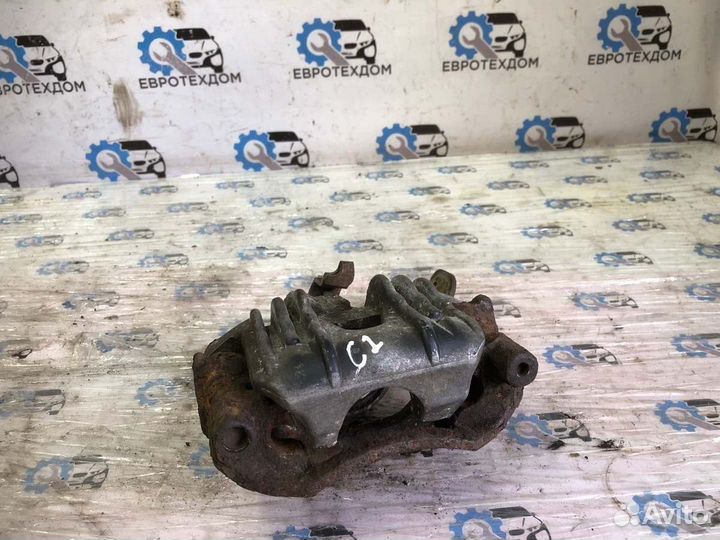 Суппорт передний левый Opel Astra G универсал