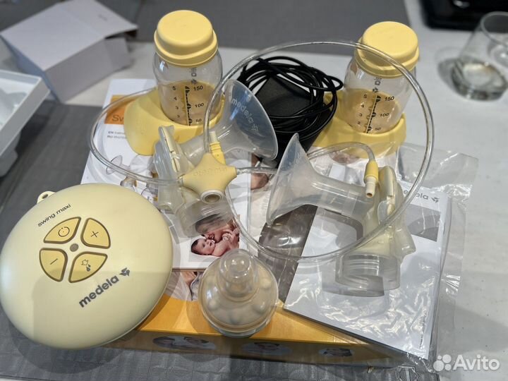 Молокоотсос электрический Medela swing maxi& calma
