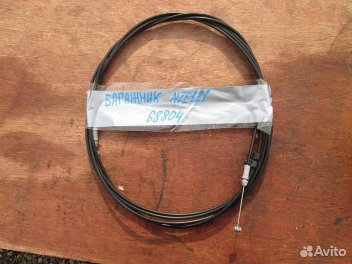 Тросик багажника Toyota Corolla NZE121 1NZ-FE