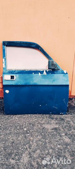 Двери передние на газ 3110