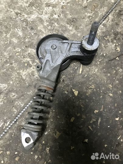 Натяжитель приводного ремня Opel Astra J