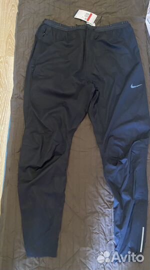 Штаны спортивные для бега Nike. Зашитаответра