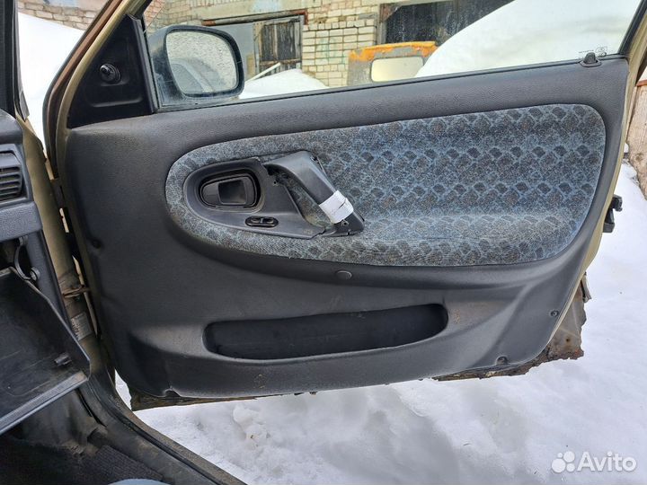 Дверные карты обшивка салона потолок Дэу Нексиа 1