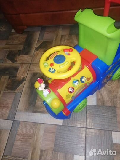 Паровозик каталка развивающий Disney