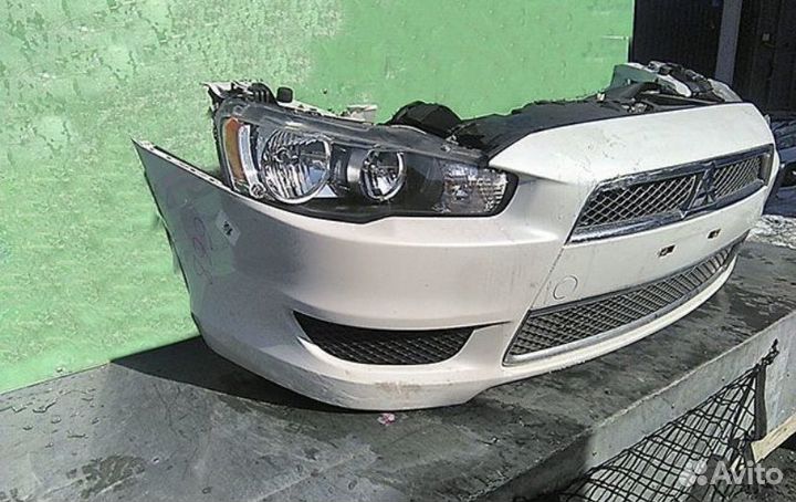 Бампер крыло капот фара на mitsubishi lancer 10