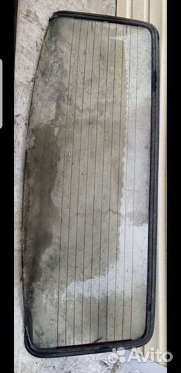 Стекло заднее Волга 3110