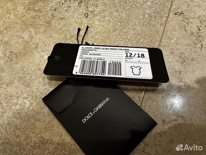 Пуговица заклепки от детского боди Dolce Gabbana