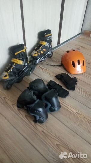 Роликовые коньки