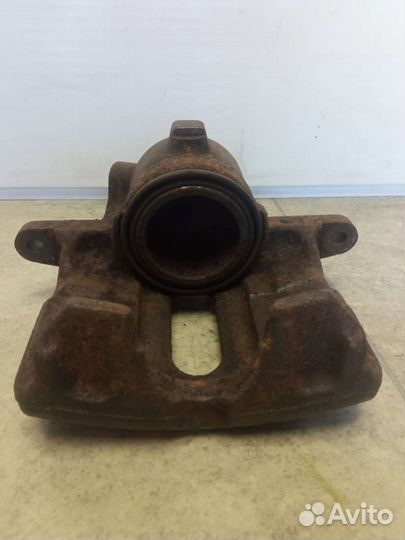 Суппорт тормозной передний левый Renault Laguna 1