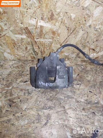 Суппорт тормозной передний левый Mazda 3 BL