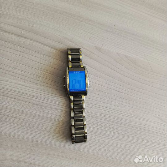 Часы sharp