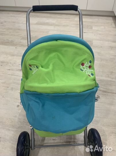 Игрушечная коляска для кукол