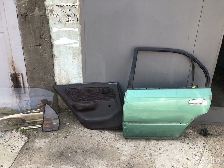 Дверь задняя левая corolla 100