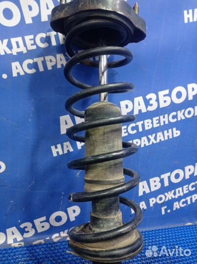 Задняя стойка амортизатора Mitsubishi Lancer Cedia