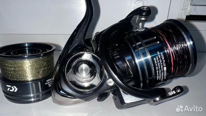 Катушка рыболовная и фидер