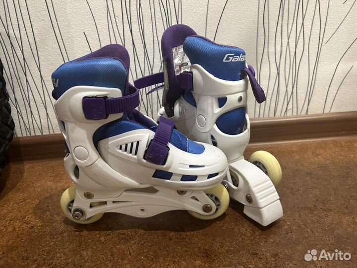 Роликовые коньки