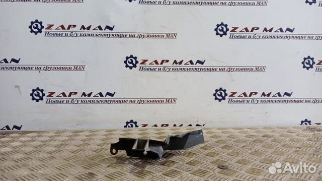 Кронштейн обтекателя кабины левый Man Tgl