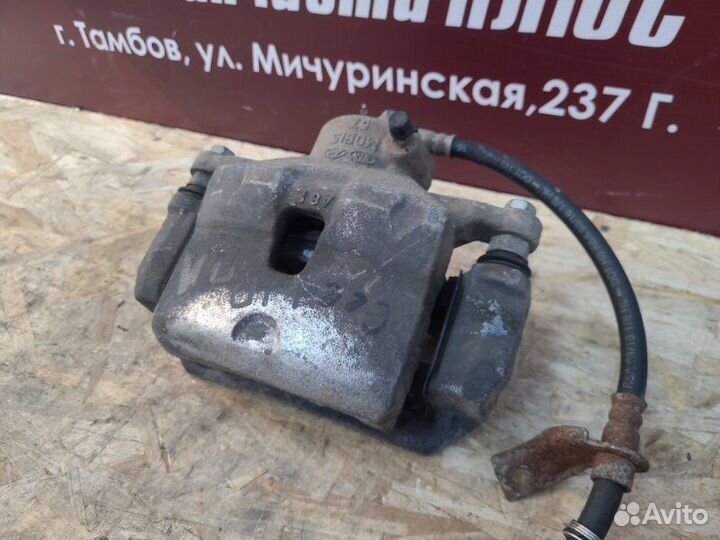 Суппорт тормозной передний левый Kia Ceed JD