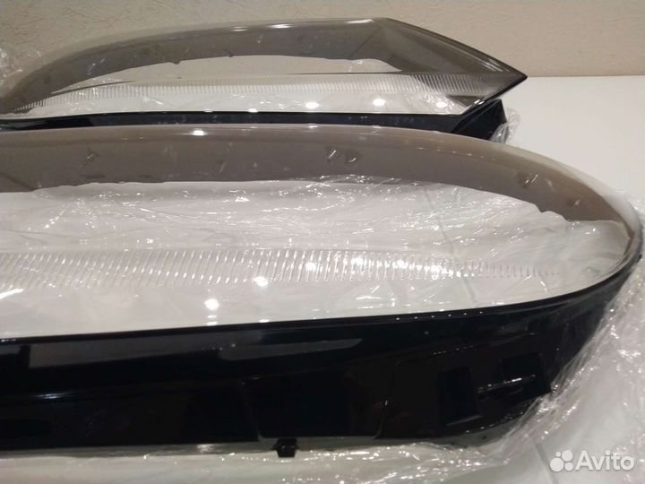 Стекло фары Фольксваген Тигуан 1