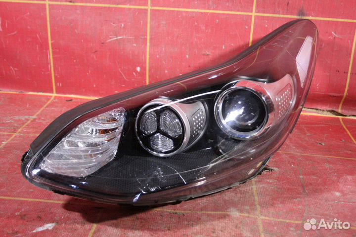 Фара левая Kia Sportage