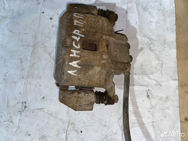 Суппорт тормозной передний правый Mitsubishi