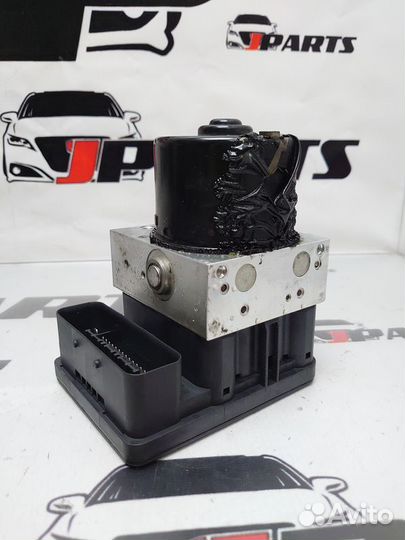 Блок ABS (насос) Mitsubishi Outlander