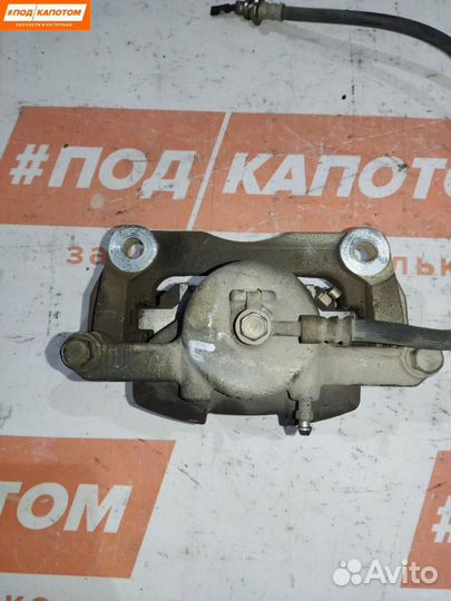 Суппорт тормозной передний левый Nissan X-Trail