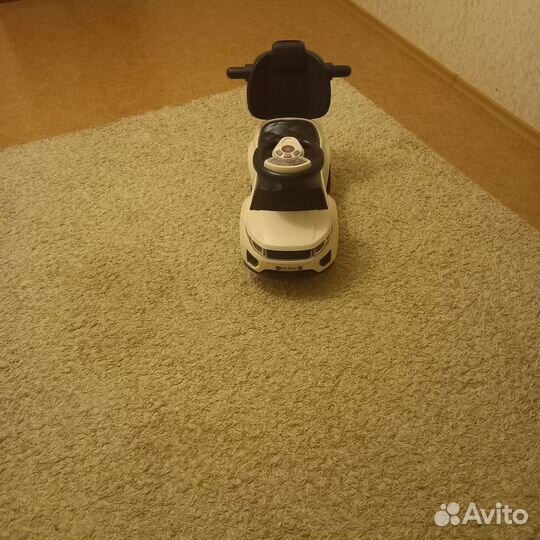 Детская машинка каталка с ручкой б/у