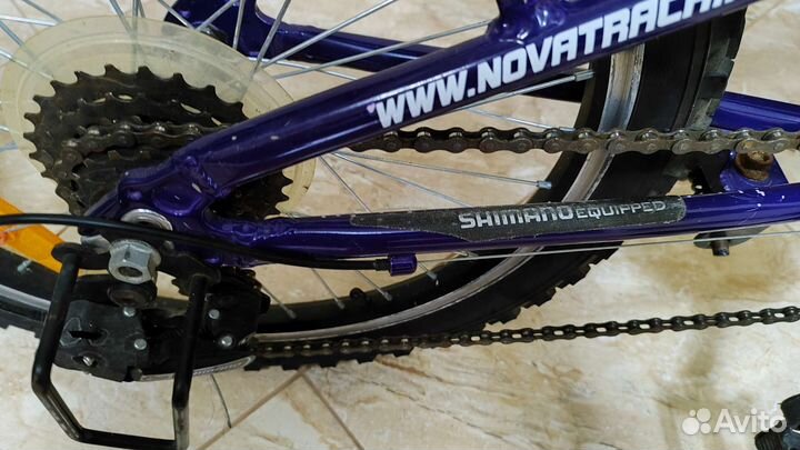 Детский велосипед бу novatrack neon