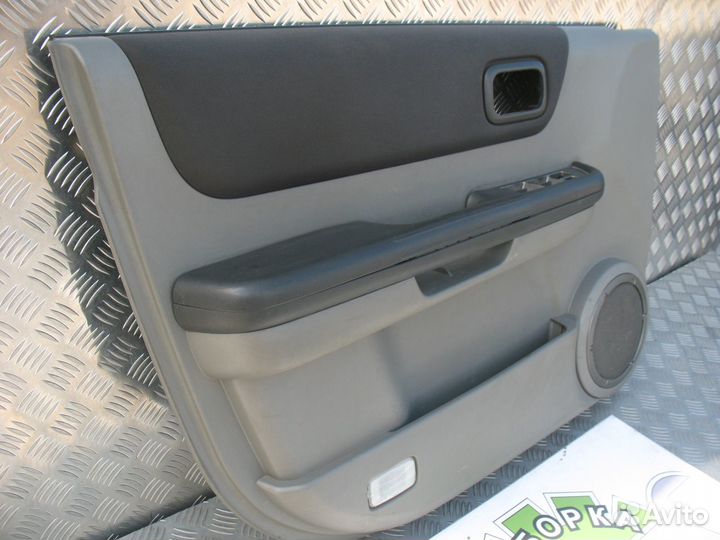 Обшивка двери передней левой Nissan X-Trail T30