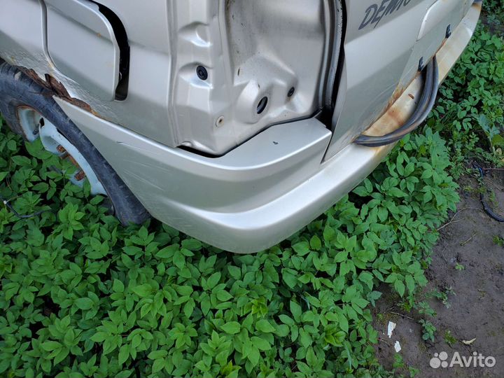 Бампер задний мазда Demio