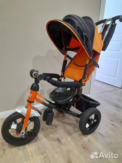 Трехколесный велосипед с ручкой детский