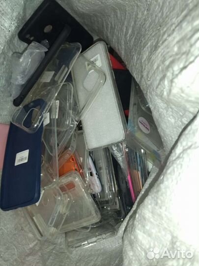 Большой мешок чехлов для телефонов