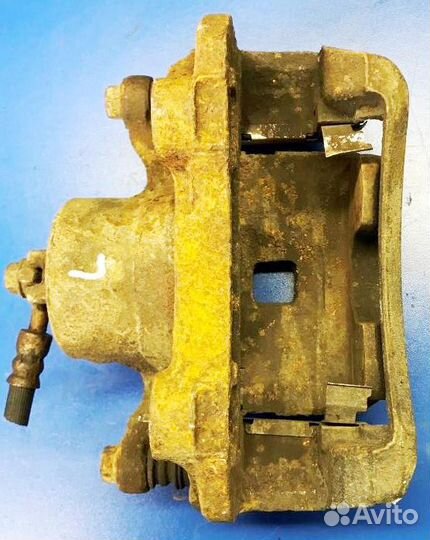 Суппорт левый Ниссан Альмера Тино