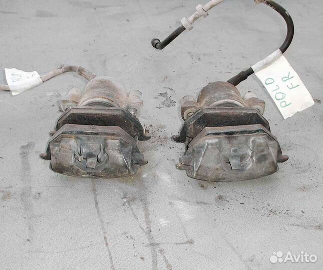 Суппорт передний VW Polo 04г 1.4 16кл