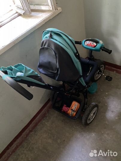 Трехколесный велосипед с ручкой