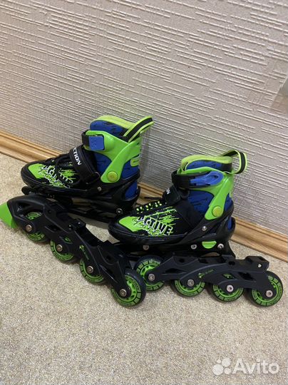 Роликовые коньки