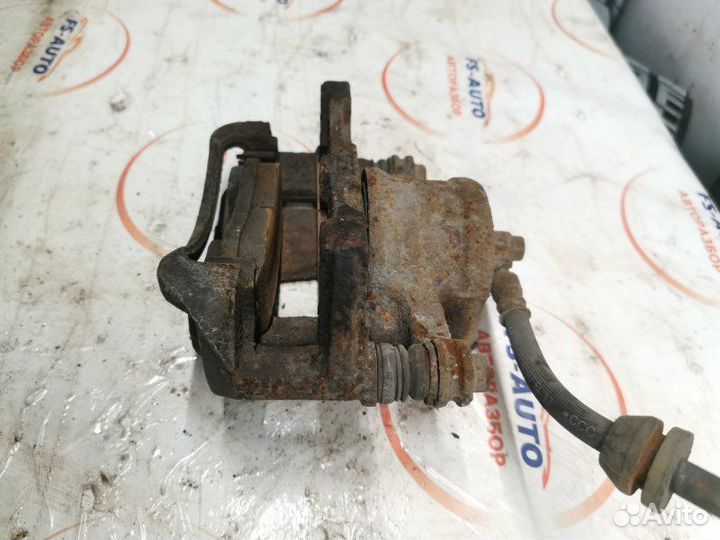 Суппорт тормозной передний правый Chevrolet Aveo T
