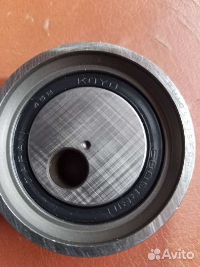 Натяжной ролик ремня грм Рено Логан фаза 1 Koyo