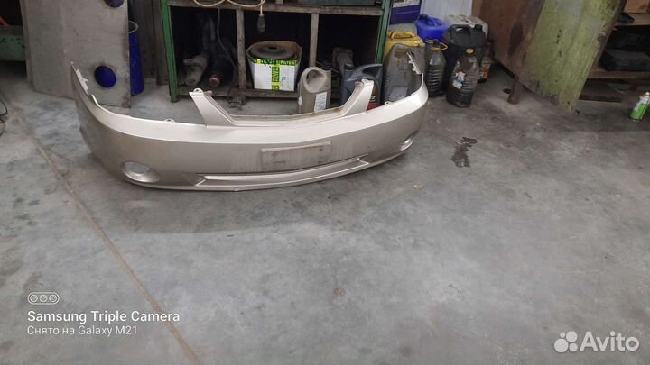 Бампер kia spectra передний