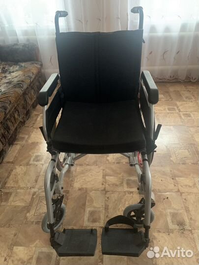 Инвалидная коляска