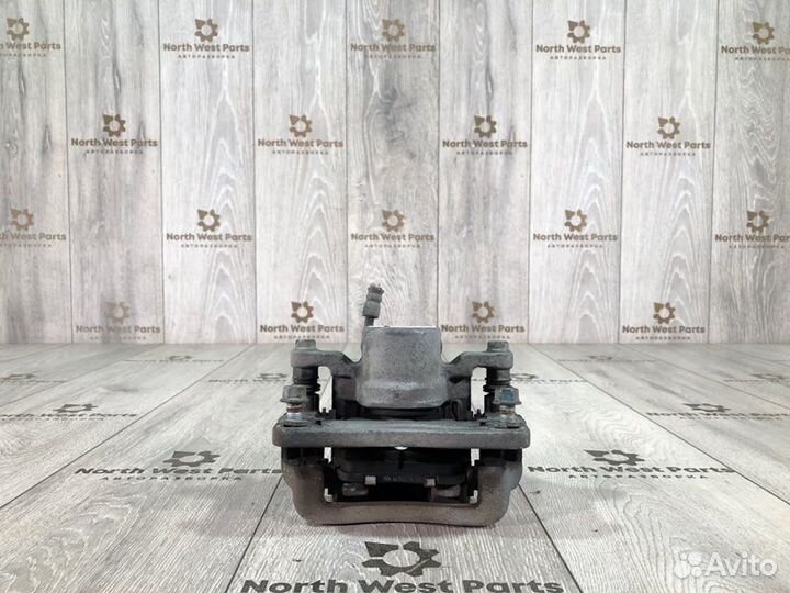 Суппорт задний левый Kia Sorento 2 внедорожник