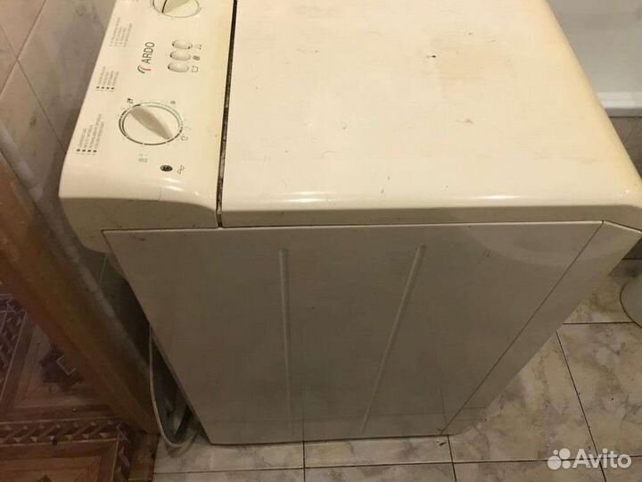 Стиральная машина с вертикальной загрузкой