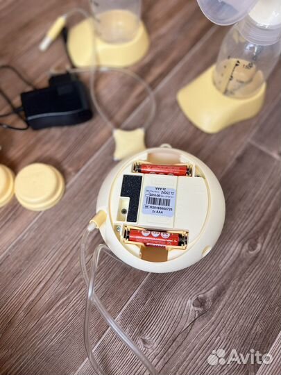 Молокоотсос medela электрический