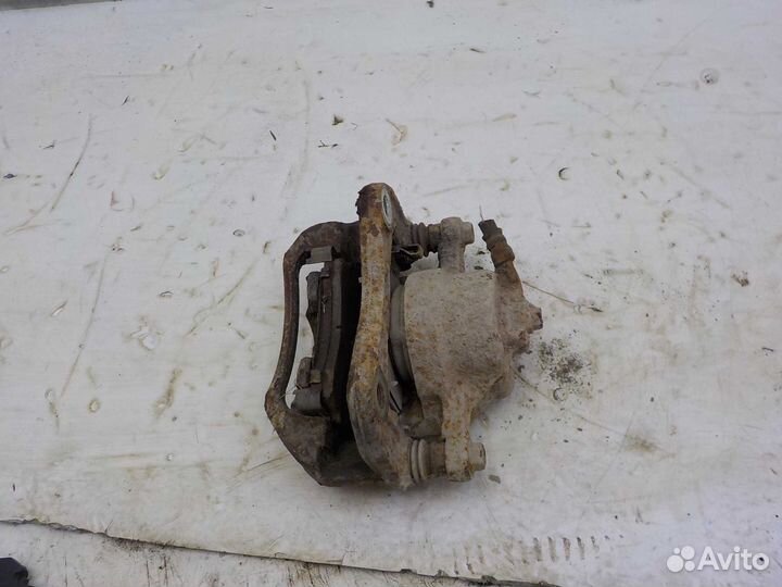 Суппорт передний левый Kia Rio 2