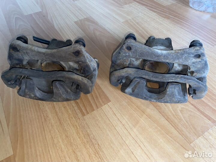 Передние Оригинальные Суппорта тормозной lancer x