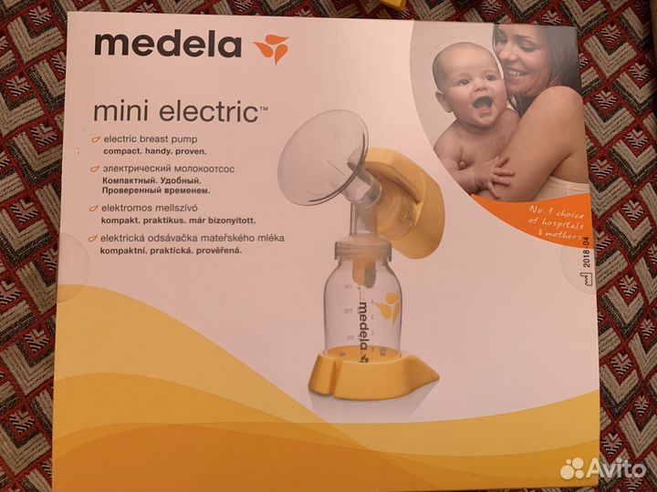 Молокоотсос medela mini электрический