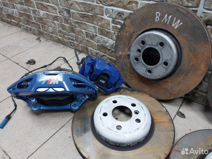 Суппорт тормозной BMW 5-Series/M5